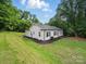 Well-maintained white brick home with manicured landscaping at 419 Wade St, Wadesboro, NC 28170