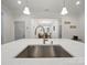 Open concept kitchen with stainless steel sink and island at 419 Wade St, Wadesboro, NC 28170
