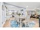 Open concept living area with seamless flow between the dining room, kitchen and living spaces at 4236 Carrington Sw Ct, Concord, NC 28027