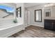 Bright bathroom features a soaking tub, glass-enclosed shower, and neutral décor at 4576 Fox Ridge Ln, Fort Mill, SC 29707
