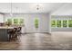 Open concept living room with abundant natural light and seamless flow into adjacent spaces at 4576 Fox Ridge Ln, Fort Mill, SC 29707