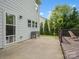 An outdoor patio area near the house features a garden and leads to a deck at 4576 Fox Ridge Ln, Fort Mill, SC 29707