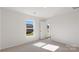 Cozy bedroom featuring a window with outside view and neutral carpeting at 4677 Fanning Rd, Hickory, NC 28602
