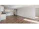 Open-concept living room with wood-look flooring and natural light creates an inviting space at 4677 Fanning Rd, Hickory, NC 28602