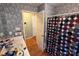 Bathroom featuring patterned wallpaper, linoleum flooring, and a sink at 508 Hillcrest St, Marshville, NC 28103