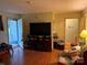 Comfortable living room with hardwood flooring, and neutral paint at 508 Hillcrest St, Marshville, NC 28103