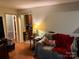 Cozy living room featuring hardwood flooring, and lots of natural light at 508 Hillcrest St, Marshville, NC 28103