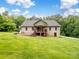 Expansive backyard with a covered deck, perfect for enjoying outdoor living and entertaining at 5369 Concord Rd, York, SC 29745