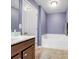 Bathroom with a combination tub and shower and a wood vanity at 5369 Concord Rd, York, SC 29745