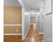Hallway features hardwood floors and neutral paint, creating a seamless flow throughout the home at 5369 Concord Rd, York, SC 29745