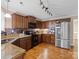 Spacious kitchen with granite countertops, stainless steel appliances, and hardwood floors at 5369 Concord Rd, York, SC 29745