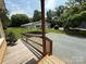 Glimpse of a spacious carport with ample parking and wooden railing at 6018 Unionville Rd, Monroe, NC 28110