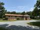 Charming home with gravel driveway and well-maintained landscaping and covered porch at 6018 Unionville Rd, Monroe, NC 28110