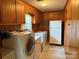 Functional laundry room with washer, dryer, and ample storage space at 6018 Unionville Rd, Monroe, NC 28110
