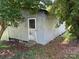 Metal exterior shed with door and windows with mature trees at 6018 Unionville Rd, Monroe, NC 28110