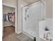 Modern bathroom with a glass shower and access to a walk-in closet at 608 Latrobe Dr, Iron Station, NC 28080