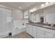 Bright bathroom featuring double sink vanity, walk in shower, and soaking tub at 608 Latrobe Dr, Iron Station, NC 28080