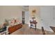 Bedroom featuring hardwood floors, a cozy bench, and a charming decorative accent at 608 Latrobe Dr, Iron Station, NC 28080