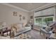 Comfortable living room with neutral tones, large window, and plush seating at 608 Latrobe Dr, Iron Station, NC 28080