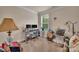 Home office space with a desk setup, bright natural light and colorful accents at 608 Latrobe Dr, Iron Station, NC 28080