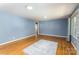 Inviting living area with hardwood floors and blue accent walls, perfect for relaxation and entertaining at 616 26Th Nw St, Hickory, NC 28601