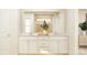 Well-lit bathroom featuring a dual sink vanity, stylish mirror, and modern fixtures at 6295 Fairfax Ct, Maiden, NC 28650