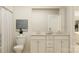 Bathroom with a double sink vanity, toilet, and shower/tub at 6295 Fairfax Ct, Maiden, NC 28650