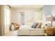 Elegant bedroom with a plush bed, comfortable seating, and serene natural light at 6295 Fairfax Ct, Maiden, NC 28650