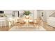 Inviting dining area with a light wood table, chairs, and a view into the living room at 6295 Fairfax Ct, Maiden, NC 28650