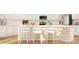 Modern kitchen with white cabinetry, stainless steel appliances, and a large island with bar stool seating at 6295 Fairfax Ct, Maiden, NC 28650