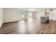 Bright, open-concept living area featuring sliding doors, light walls, and modern flooring at 6295 Fairfax Ct, Maiden, NC 28650