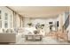 Bright and open living room connected to the kitchen featuring a comfortable sofa and stylish decor at 6295 Fairfax Ct, Maiden, NC 28650