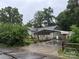 Charming exterior of a well-maintained home with a covered parking area at 6300 Fox Hunt Rd, Indian Trail, NC 28079