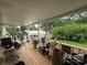 Covered front porch with plants and wooded view at 6300 Fox Hunt Rd, Indian Trail, NC 28079