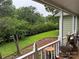 Inviting porch view overlooking a manicured lawn with lush greenery at 6300 Fox Hunt Rd, Indian Trail, NC 28079