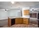 Kitchen featuring wood cabinets and an island that features a dishwasher and additional counter space at 6903 Knottywood Ln # 21, Vale, NC 28168