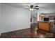 Hardwood floors throughout the open living space, connecting the living room to the kitchen at 6903 Knottywood Ln # 21, Vale, NC 28168