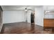 Open-concept living room boasting beautiful hardwood floors and seamless flow to the kitchen at 6903 Knottywood Ln # 21, Vale, NC 28168