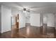 Spacious living room with hardwood floors leading to various rooms, offering a versatile layout at 6903 Knottywood Ln # 21, Vale, NC 28168