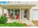 Inviting front porch with seating, perfect for relaxing and enjoying the outdoors at 693 Carybrook Ct, York, SC 29745