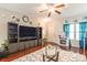 Spacious living room with a fireplace, hardwood floors, and ample space for entertainment at 693 Carybrook Ct, York, SC 29745
