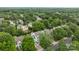 Beautiful aerial view of a suburban neighborhood filled with lush greenery and well-maintained homes at 720 Camaross Dr, Charlotte, NC 28270