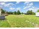 Extensive backyard featuring mature trees, open space, and a covered outdoor structure at 7990 W Nc 152 Hwy, Mooresville, NC 28115