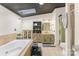 A relaxing bathroom with a soaking tub, vanity, and natural light from a skylight at 7990 W Nc 152 Hwy, Mooresville, NC 28115