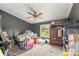Functional bedroom filled with furniture and a window view at 7990 W Nc 152 Hwy, Mooresville, NC 28115