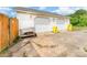 Detached two-car garage with ample parking space and mature trees at 7990 W Nc 152 Hwy, Mooresville, NC 28115