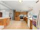 Traditional kitchen featuring wood cabinets, neutral countertops, and stainless steel appliances at 7990 W Nc 152 Hwy, Mooresville, NC 28115