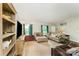 Inviting living area boasts neutral tones, plush seating, and large windows offering scenic outdoor views at 7990 W Nc 152 Hwy, Mooresville, NC 28115