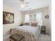Comfortable bedroom with a queen-sized bed and natural light at 800 Isle Of Palms Ct, Fort Mill, SC 29708