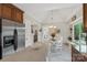Bright eat-in kitchen with stainless appliances, breakfast nook, and a view of the backyard at 800 Isle Of Palms Ct, Fort Mill, SC 29708